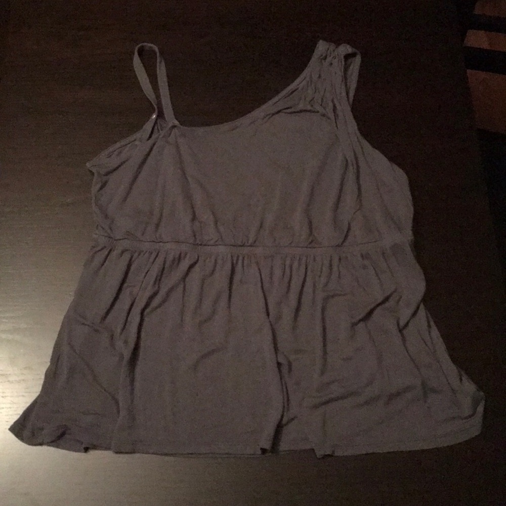 A grey sleeveless blouse